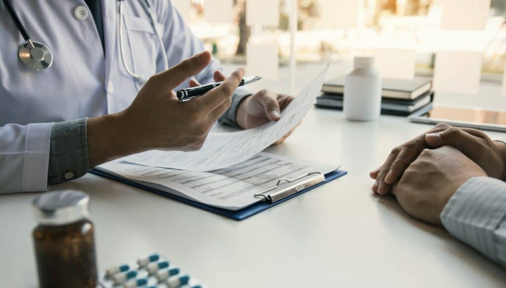Doctor talking to the patient about menopause and treatment in future.