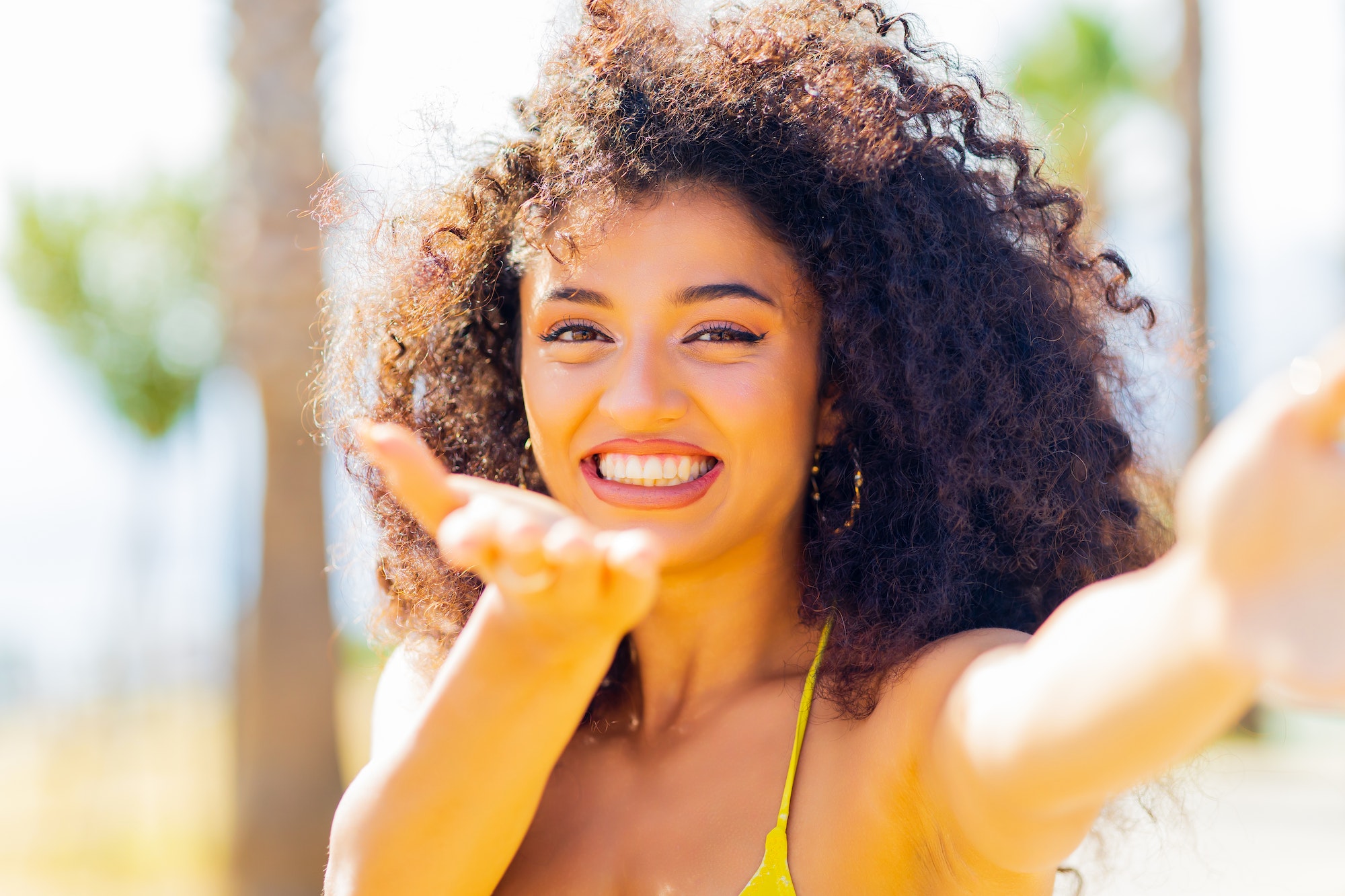 Happiness bliss freedom concept , brazilian woman enjoying at the beach