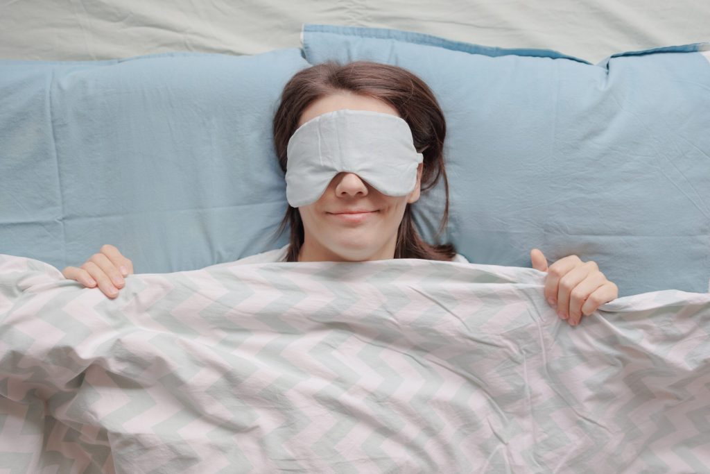 a young woman with sleep deprivation and mental difficulties. jet lag or insomnia due to stress