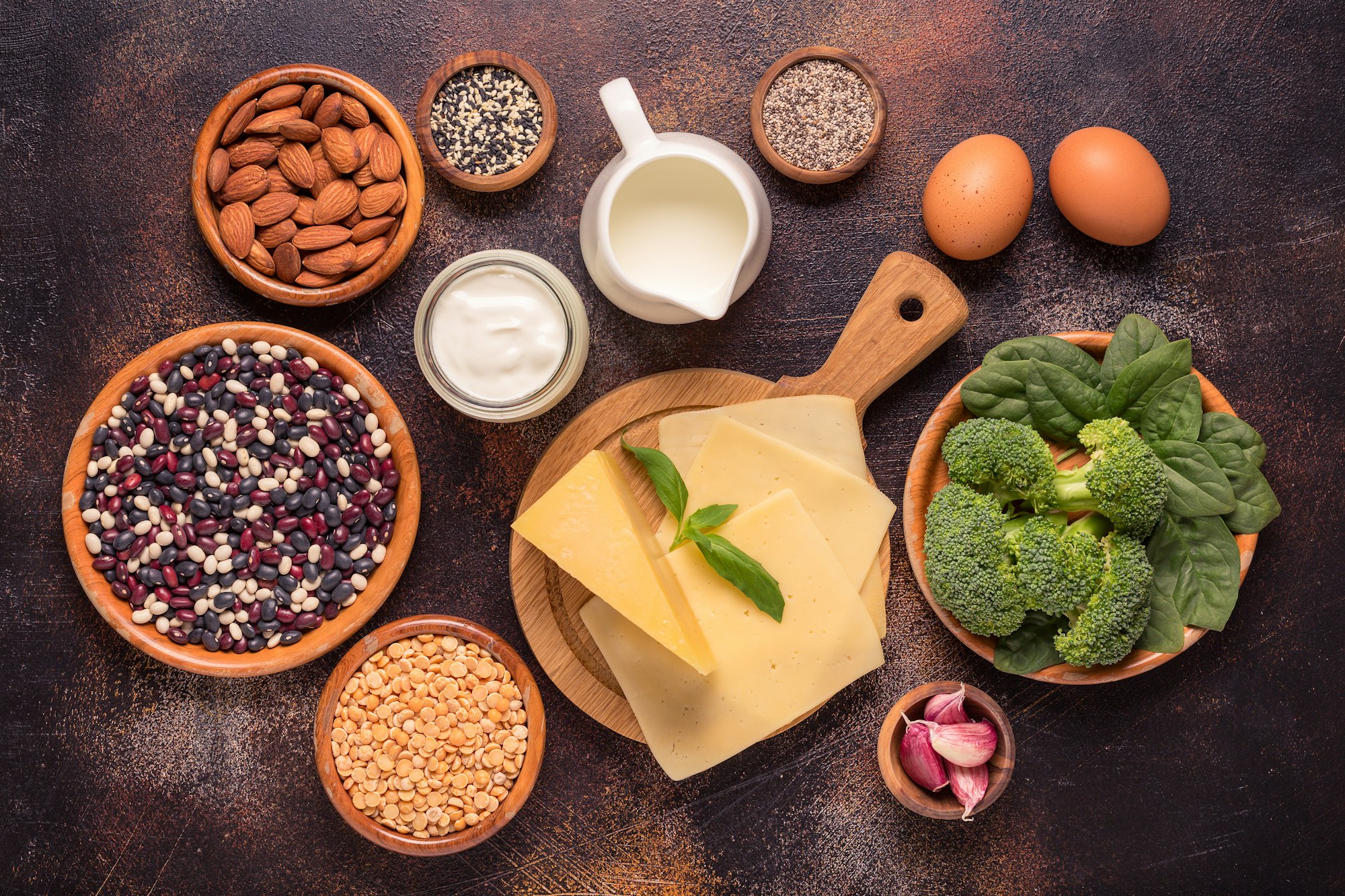 Products rich in calcium on dark background.