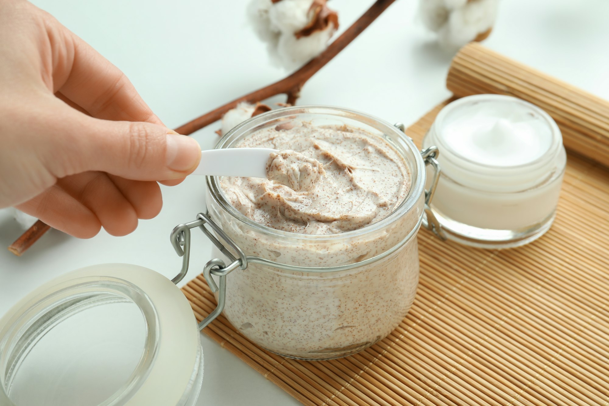 Skin care scrub concept on white background