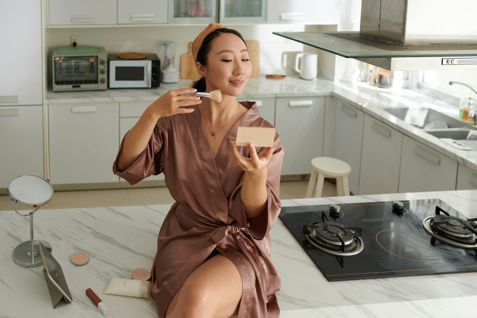 Woman Applying Powder Contour